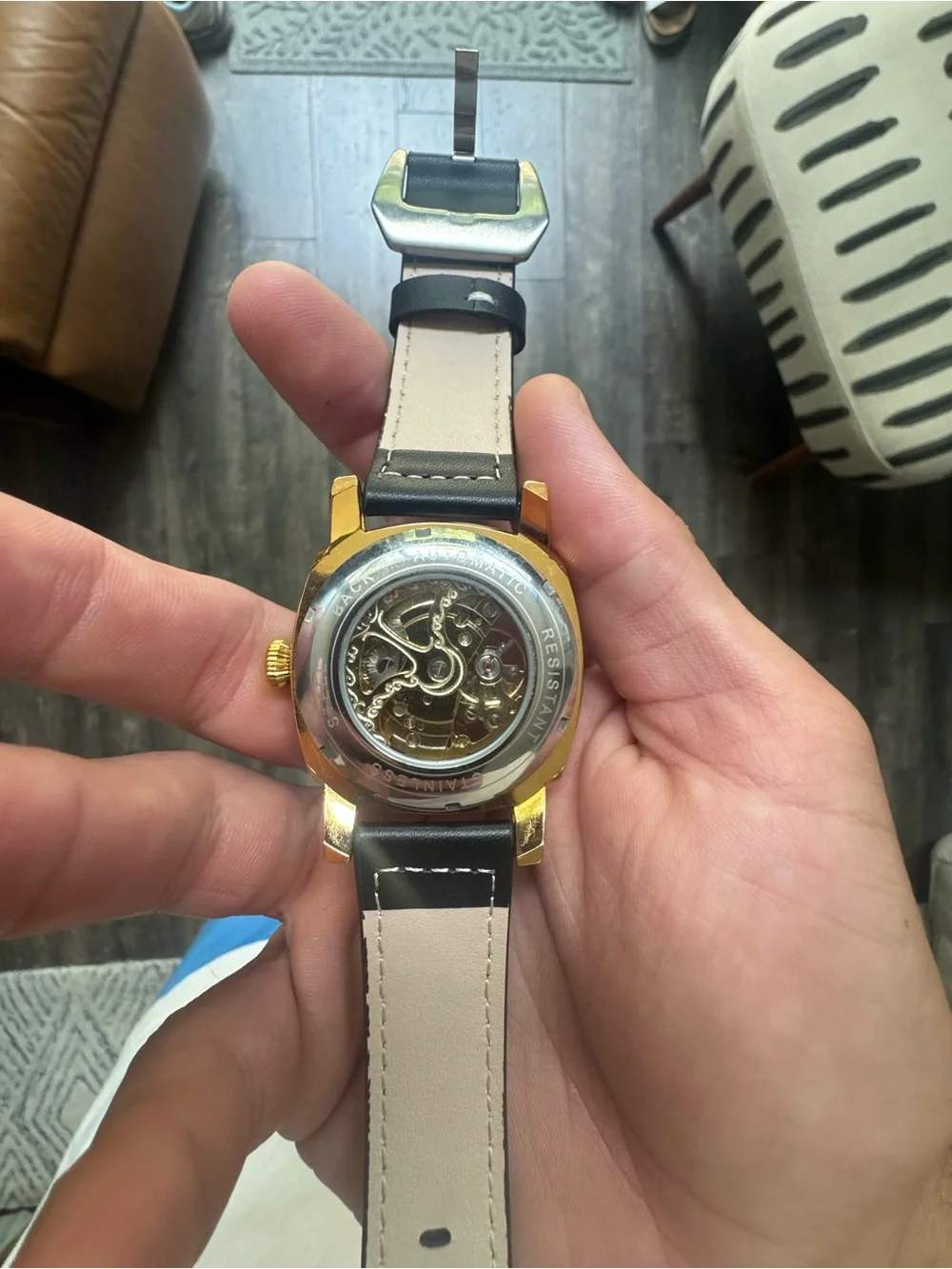 Gold Skeleton Mechanical Watch with Black Leather Strap